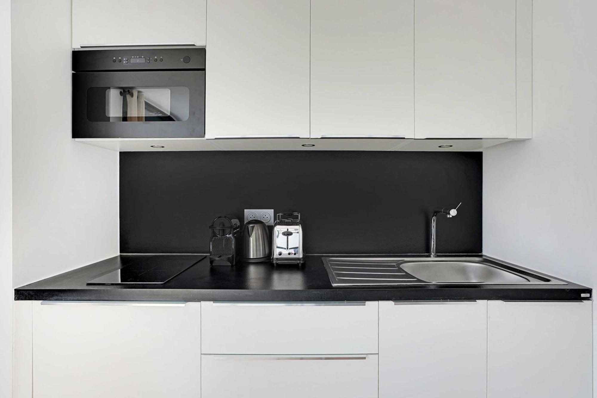 Raffinement Et Confort Dans Cette Residence A Levallois-Perret Luaran gambar